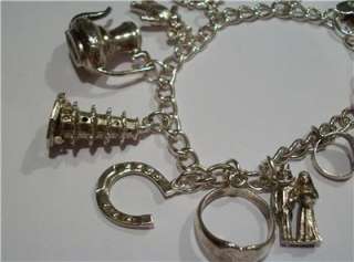 SOLID SILVER 1973 CHARM BRACELET 11 CHARMS   36 GRAMS, LARGE CHARMS 