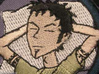 MTV DARIA EMBROIDERED PATCH TRENT LYING ON PILLOW  