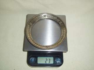Weighed on Home digital scale w/o glass insert; 23grams.