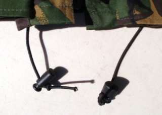 Elasticated drawcord and locking toggles at waist