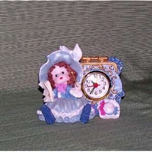  Clock with Little Girl Reading Sheet Music. Electronics