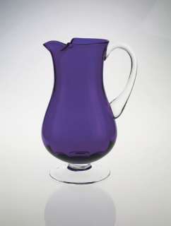 This footed purple crystal beverage pitcher is a beautiful way to 