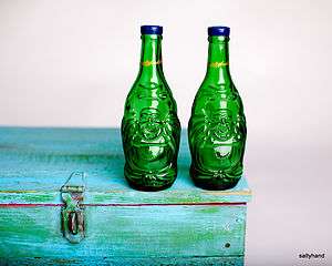 LUCKY BUDDHA BEER BOTTLE SALT AND PEPPER SHAKERS IN RETRO GREEN GLASS 