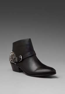 SAM EDELMAN Pax Studded Buckle Boot in Black at Revolve Clothing 
