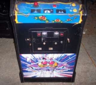 This is a used 1981 Galaga Arcade Video Game in Good Working Condition 