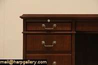 about 30 years old a classic walnut executive desk has two pull out 