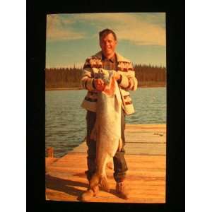 Man w/fish, Great Bear Lodge, Sioux Falls, South Dakota not 